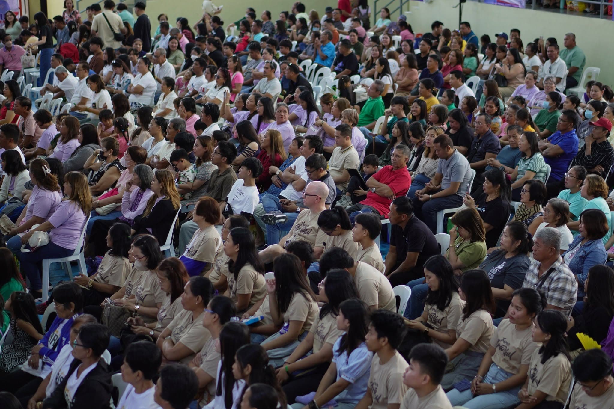 Hundreds of brethren seated together at a PBCi Inter-Church Fellowship.