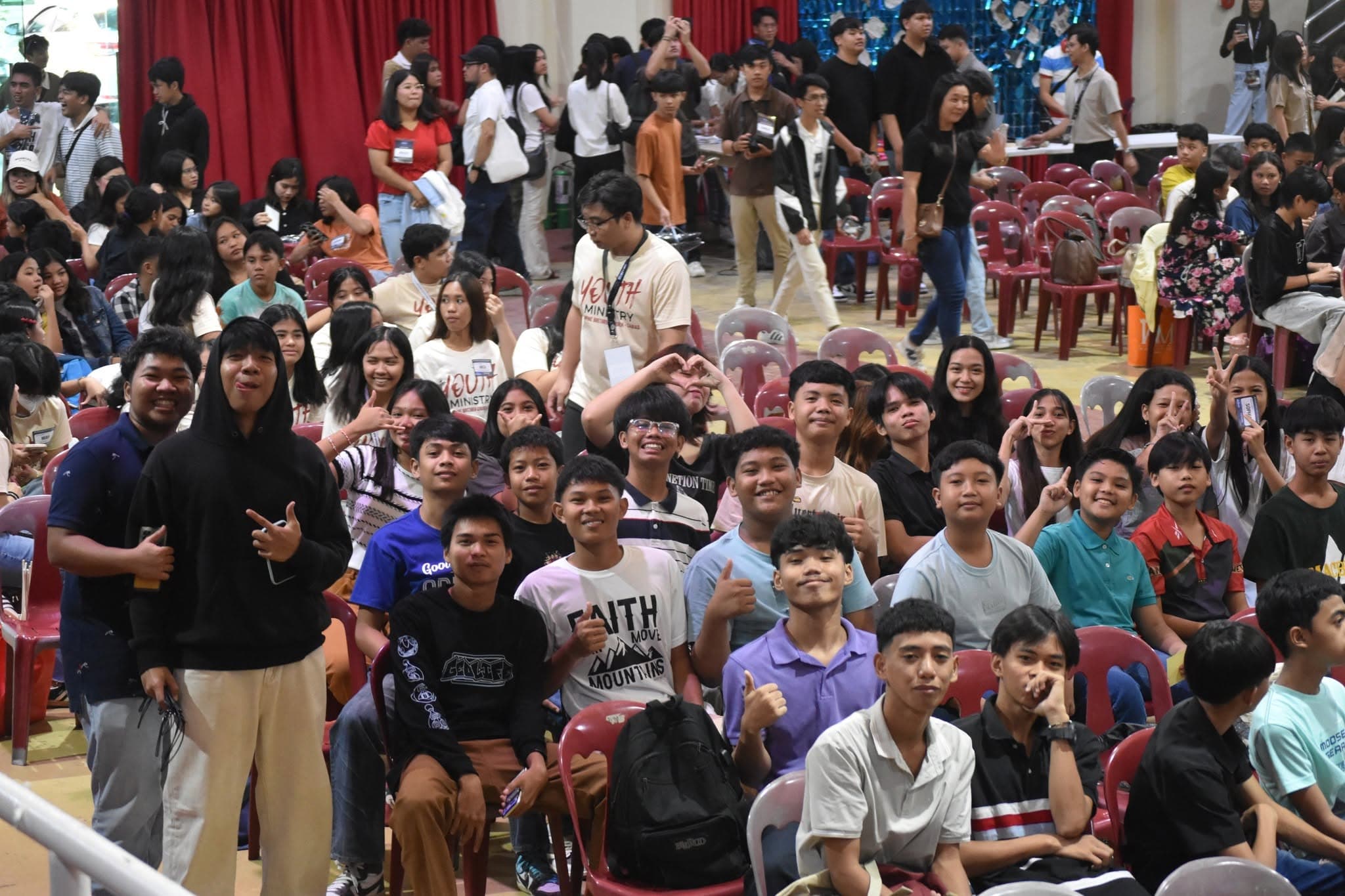 Young people filling the hall at the PBCi Youth Fellowship.